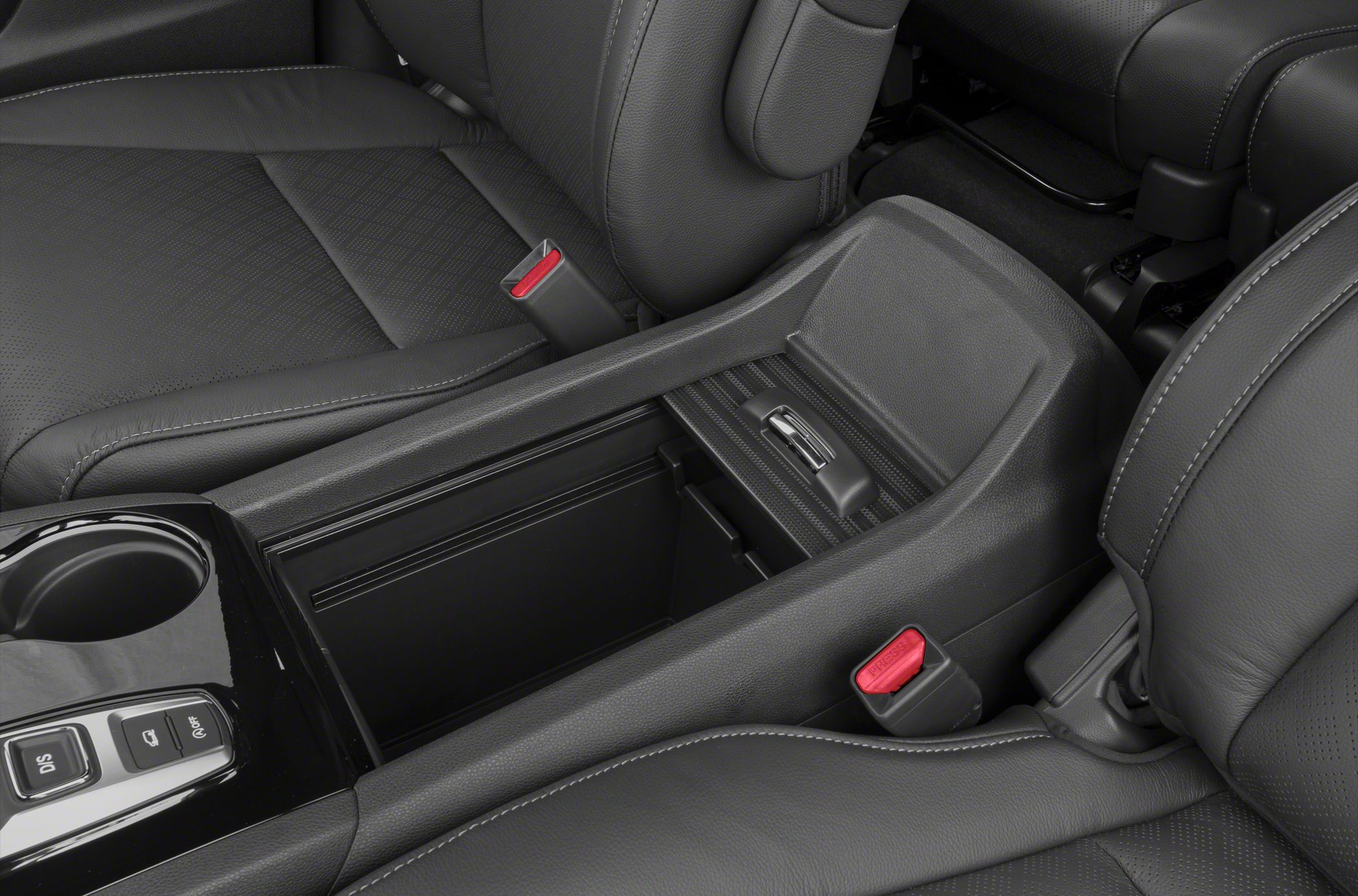 Black leather seats and center console storage compartment with controls