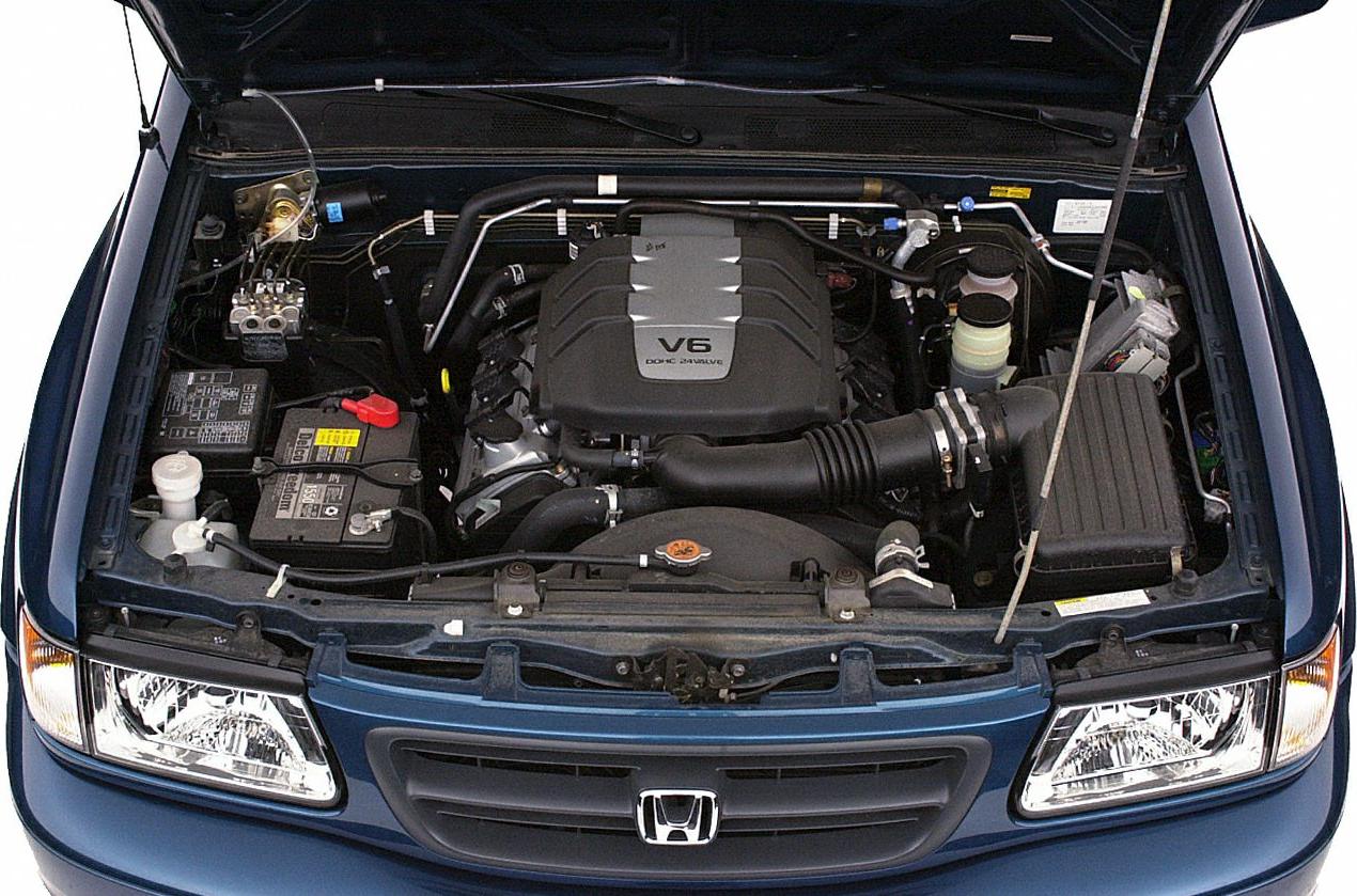 V6 DOHC 24 valve engine in open engine bay of vehicle