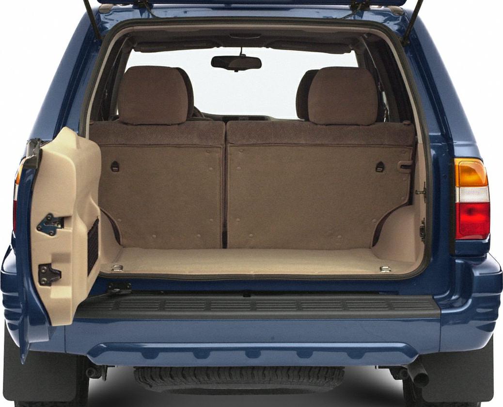 Open rear cargo area with split folding seats and rear door