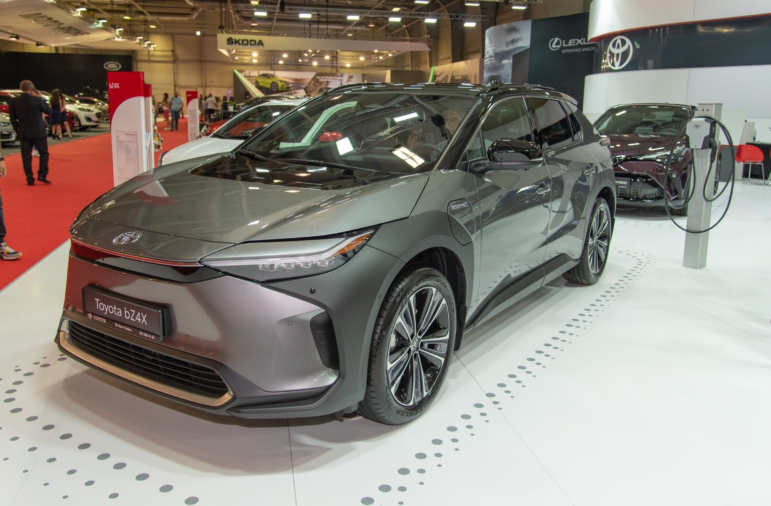 Front and side view of electric SUV with modern LED headlights and alloy wheels