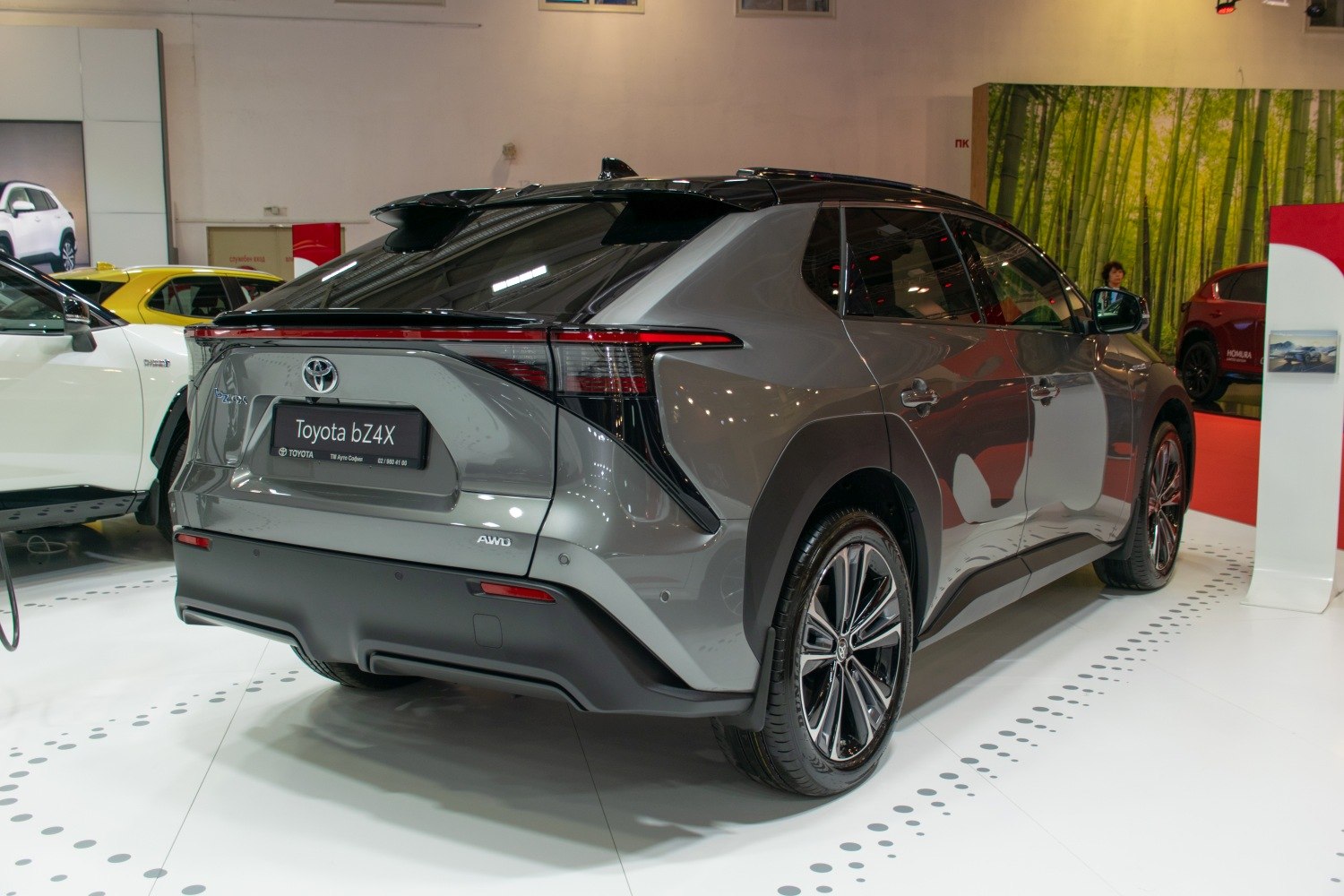 Sleek rear view of AWD electric SUV with modern taillights and alloy wheels