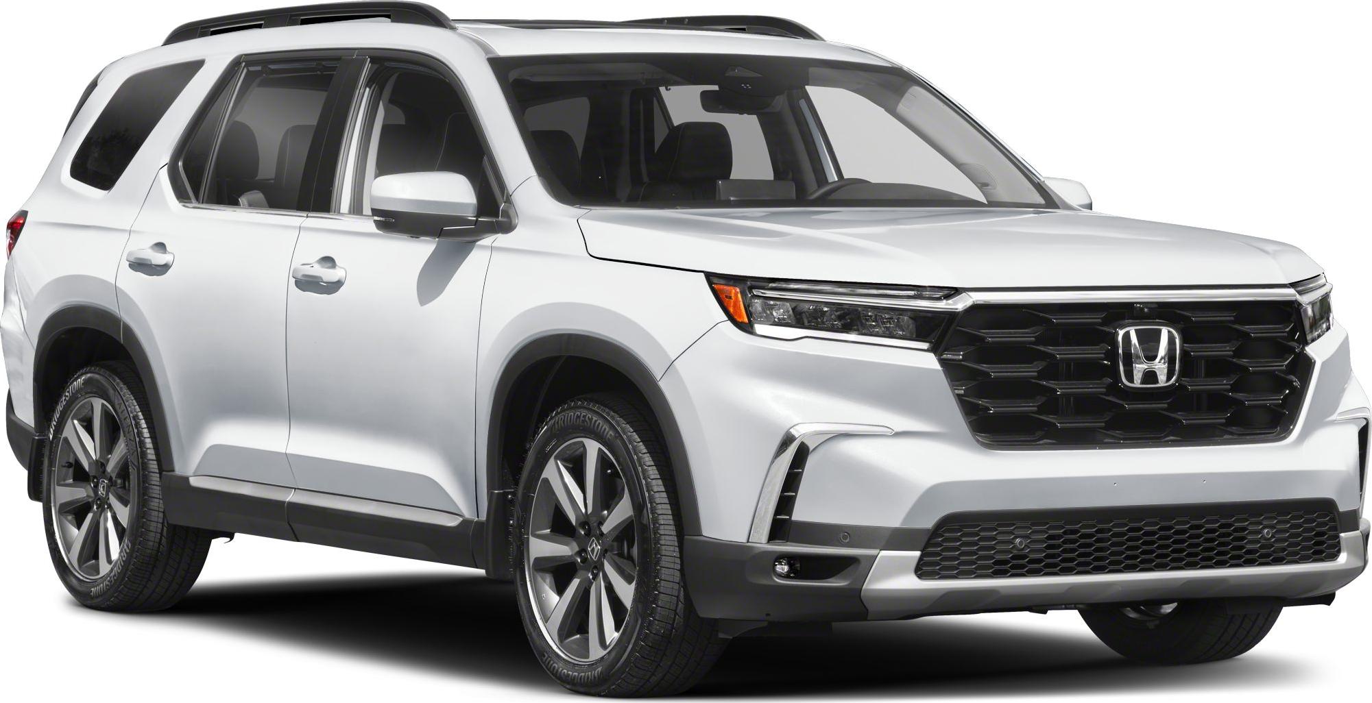 Sleek LED headlights with bold black grille and roof rails on mid-size SUV