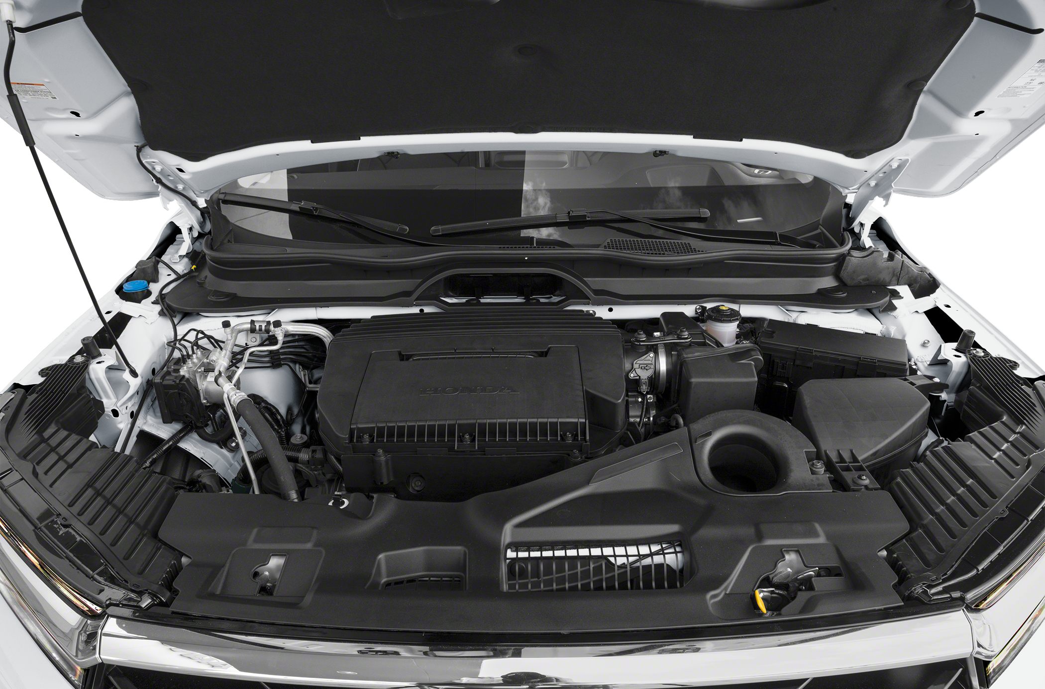 Covered engine compartment and surrounding mechanical components.