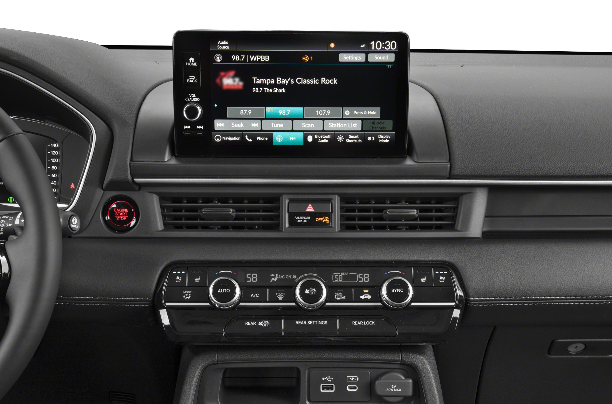 Car interior dashboard with infotainment touchscreen and climate control panel