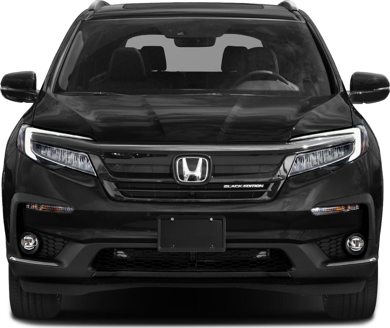 Front view of black SUV with LED headlights and Black Edition badge.