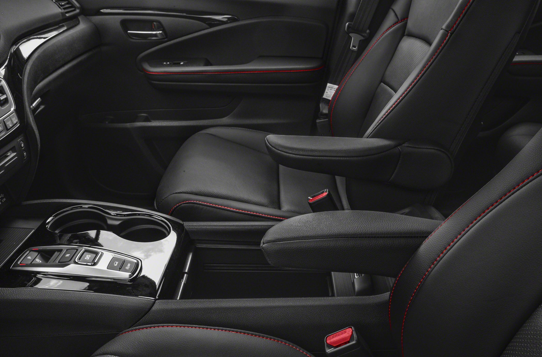 Black leather seats with red stitching and center console