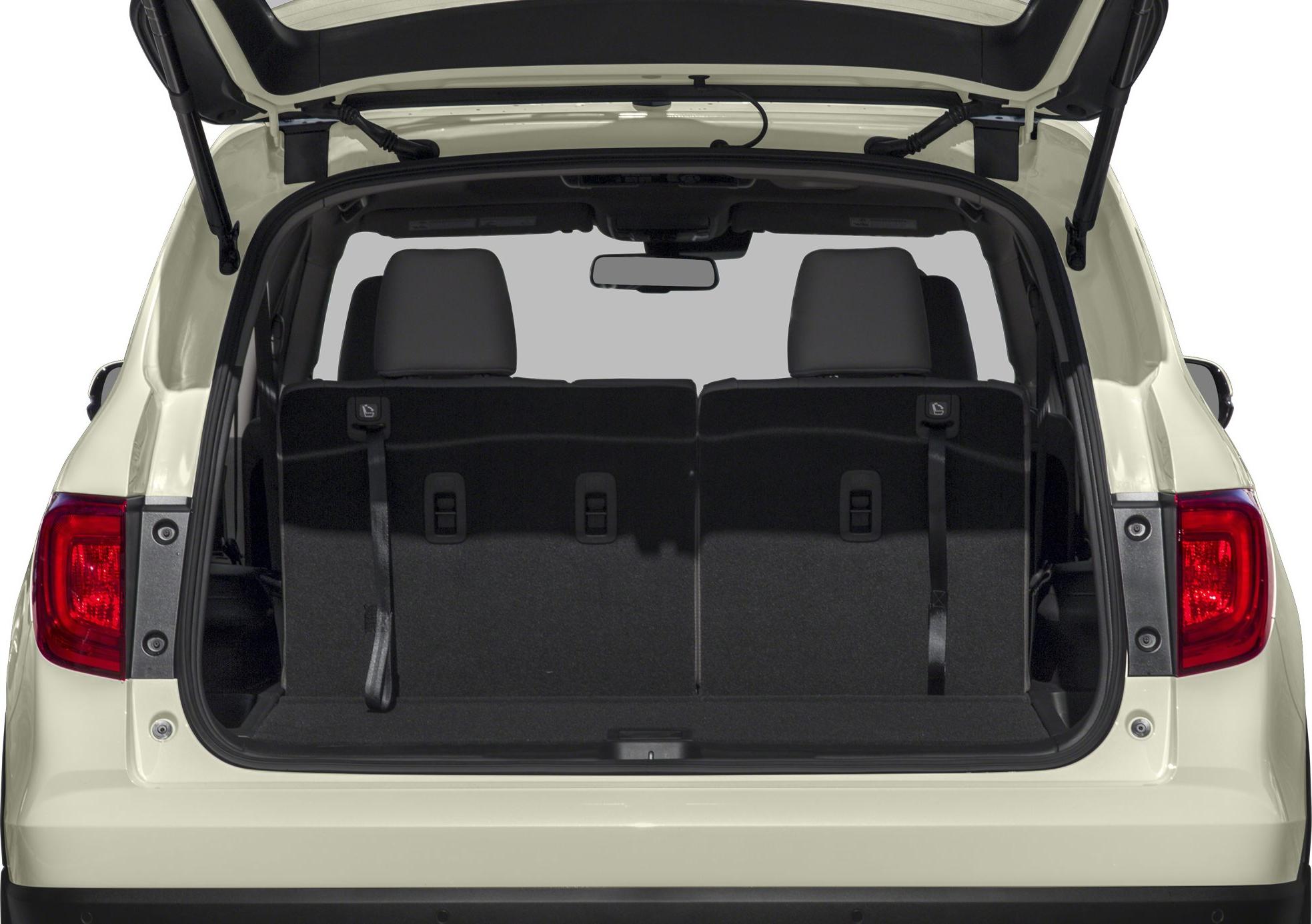 Open rear cargo area with foldable back seats and headrests