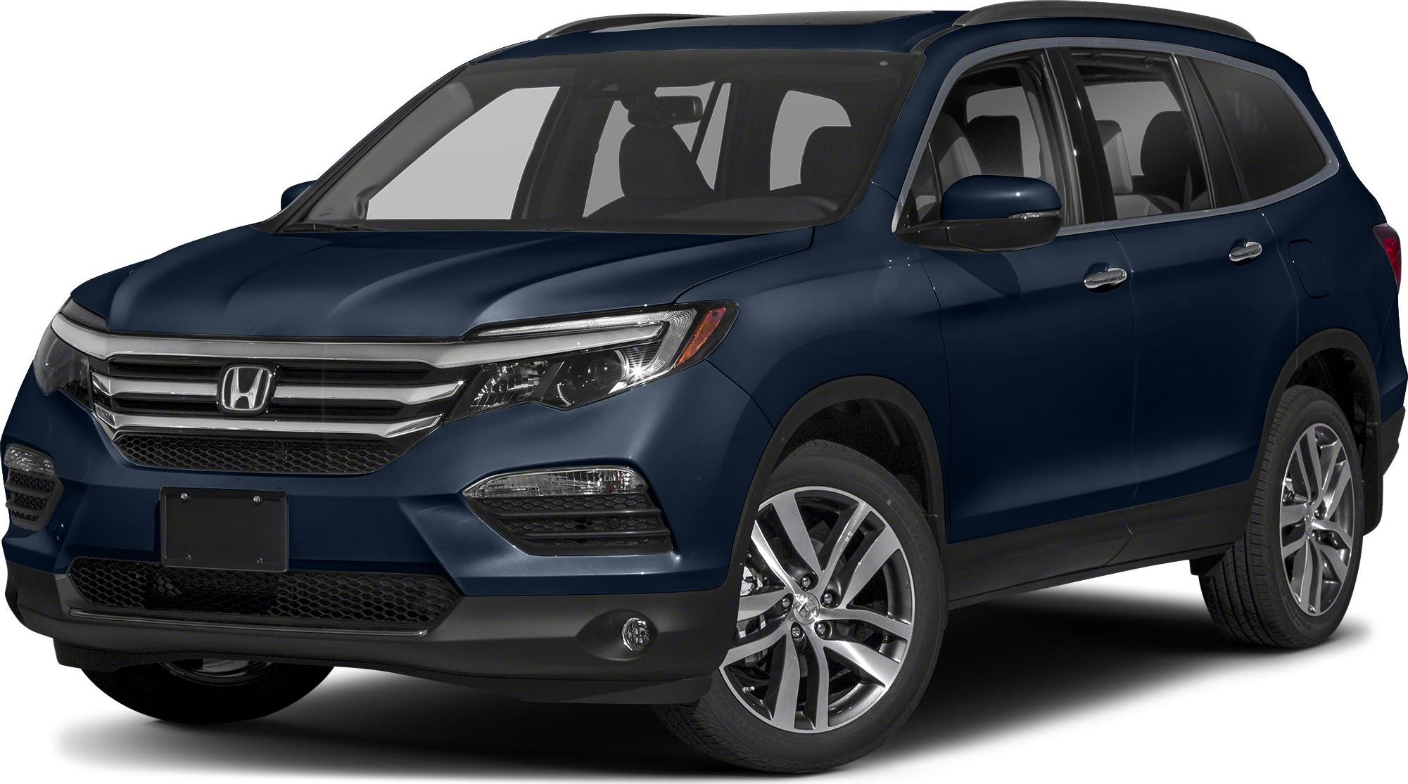 Midsize SUV with LED headlights and alloy wheel design.