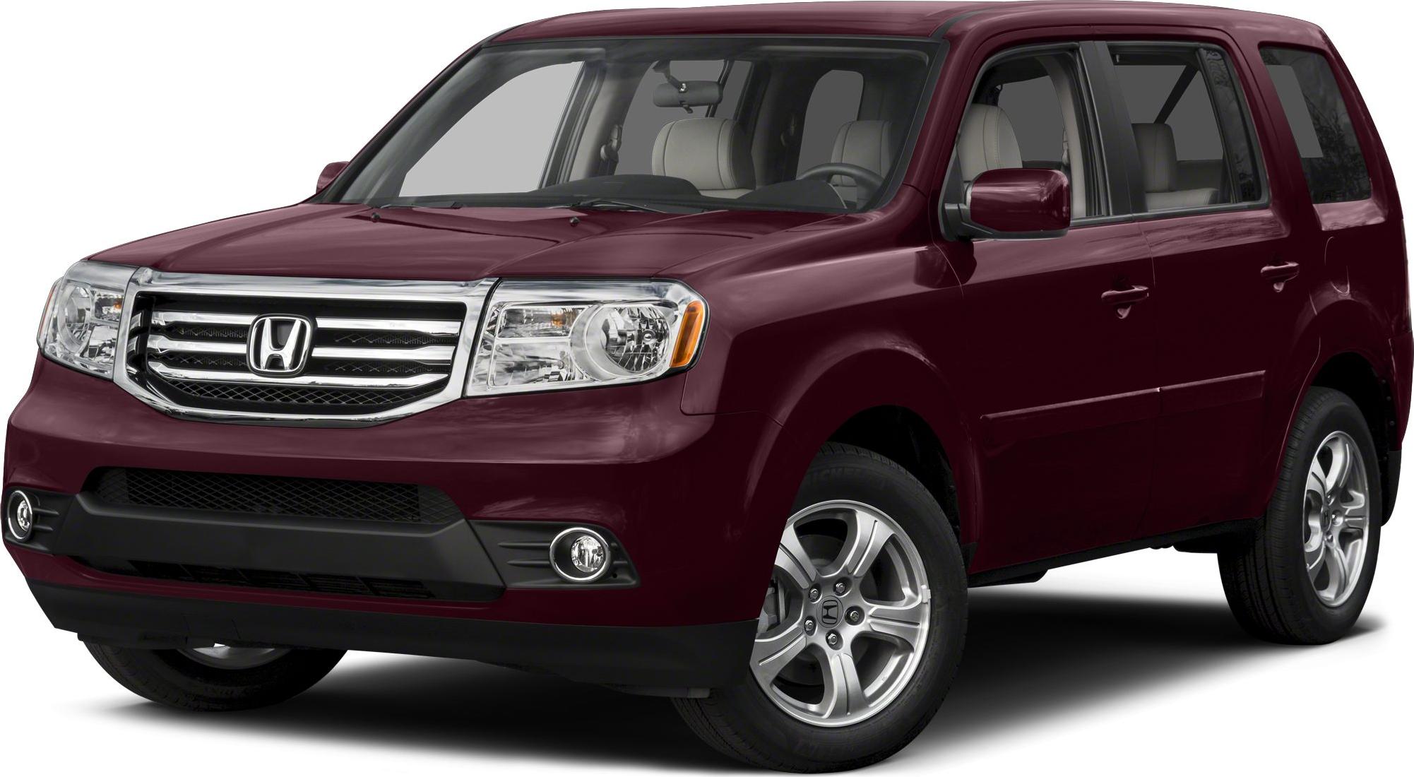Front side view of SUV with chrome grille and alloy wheels