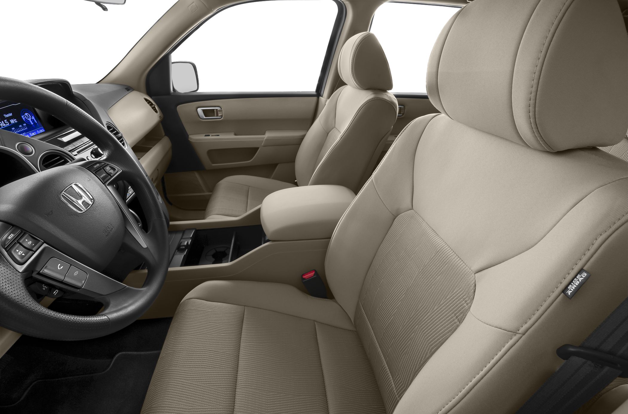 Beige front seats and black steering wheel in a car interior