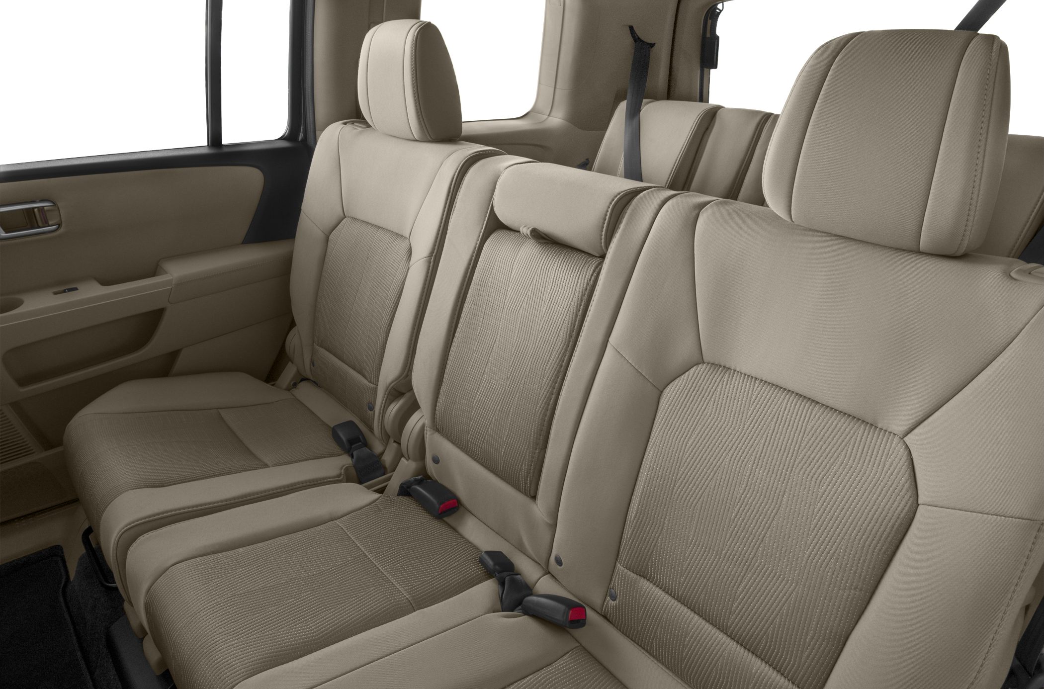 Beige rear seats with headrests and seatbelts
