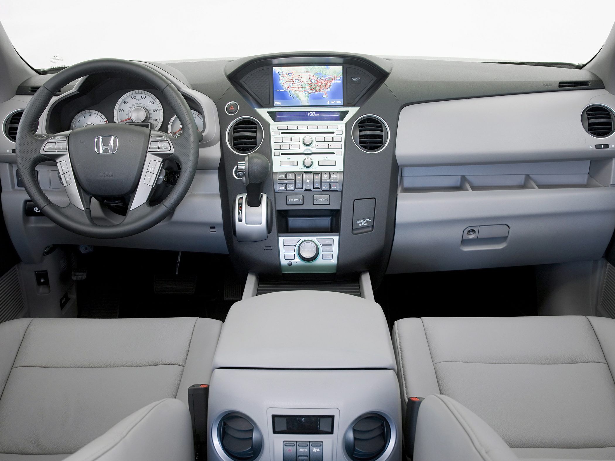 Dashboard with navigation screen and multifunction steering wheel