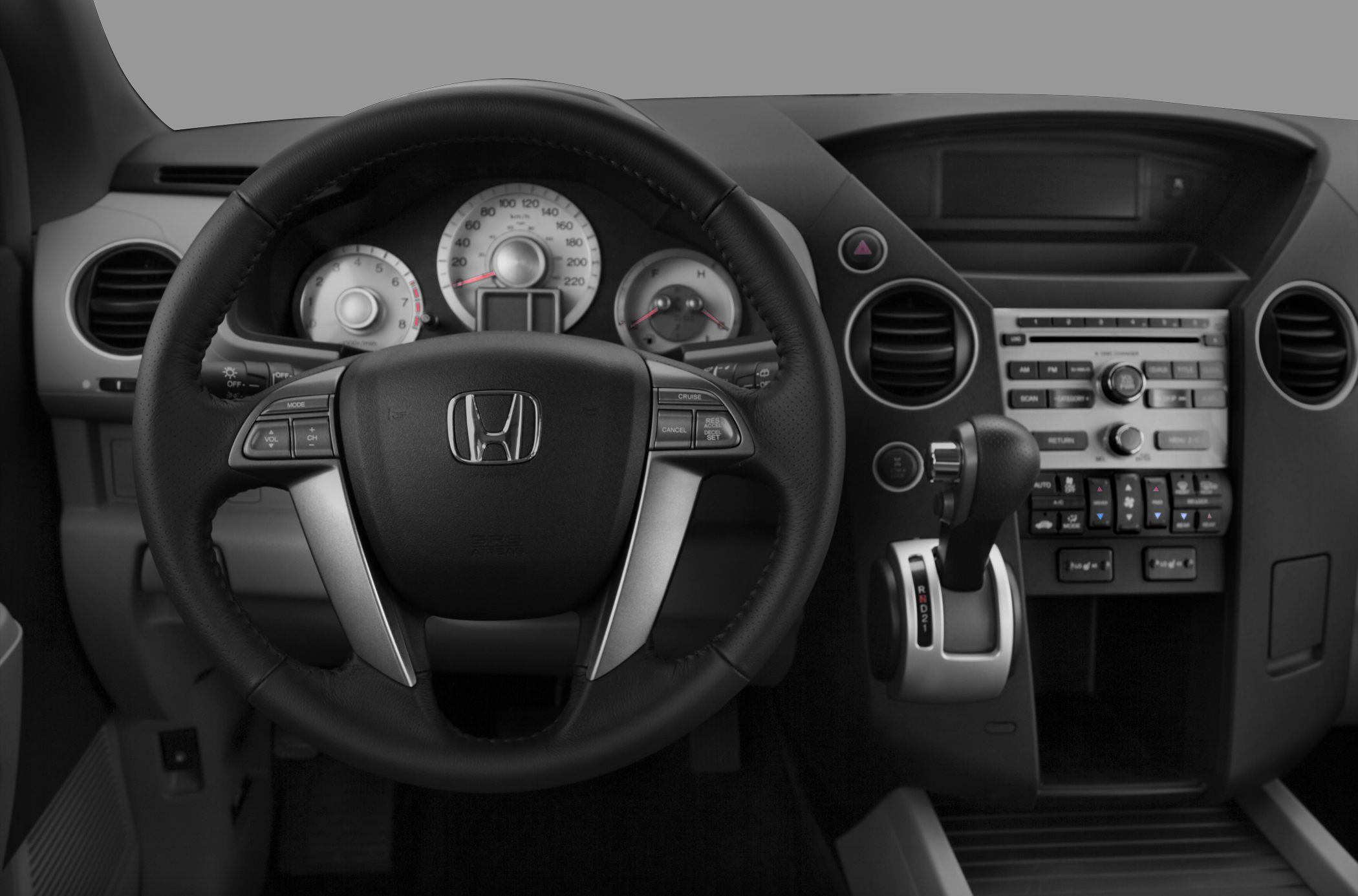 Steering wheel with controls and detailed dashboard instrument cluster