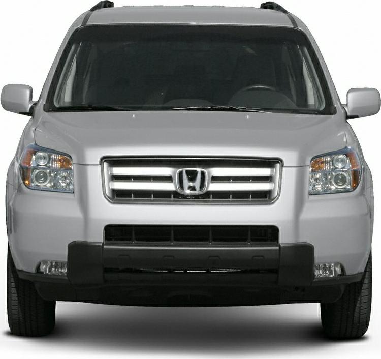 Front view of a silver midsize SUV with chrome grille and multi-section headlights.