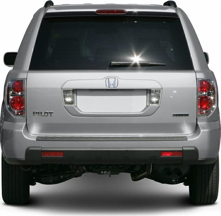 Rear view with tailgate, taillights, and rear bumper of an SUV.