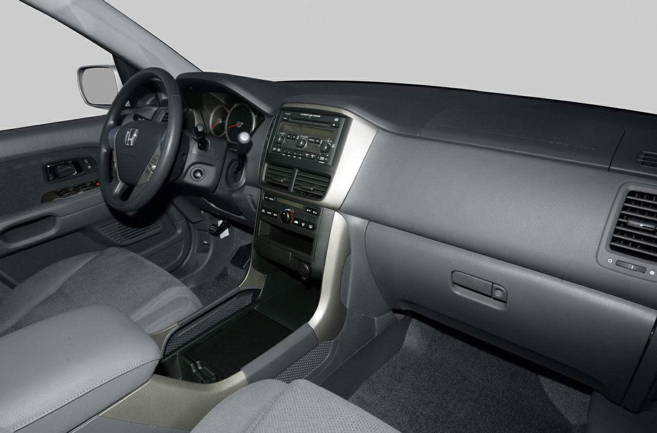 Interior dashboard and center console with controls and seating
