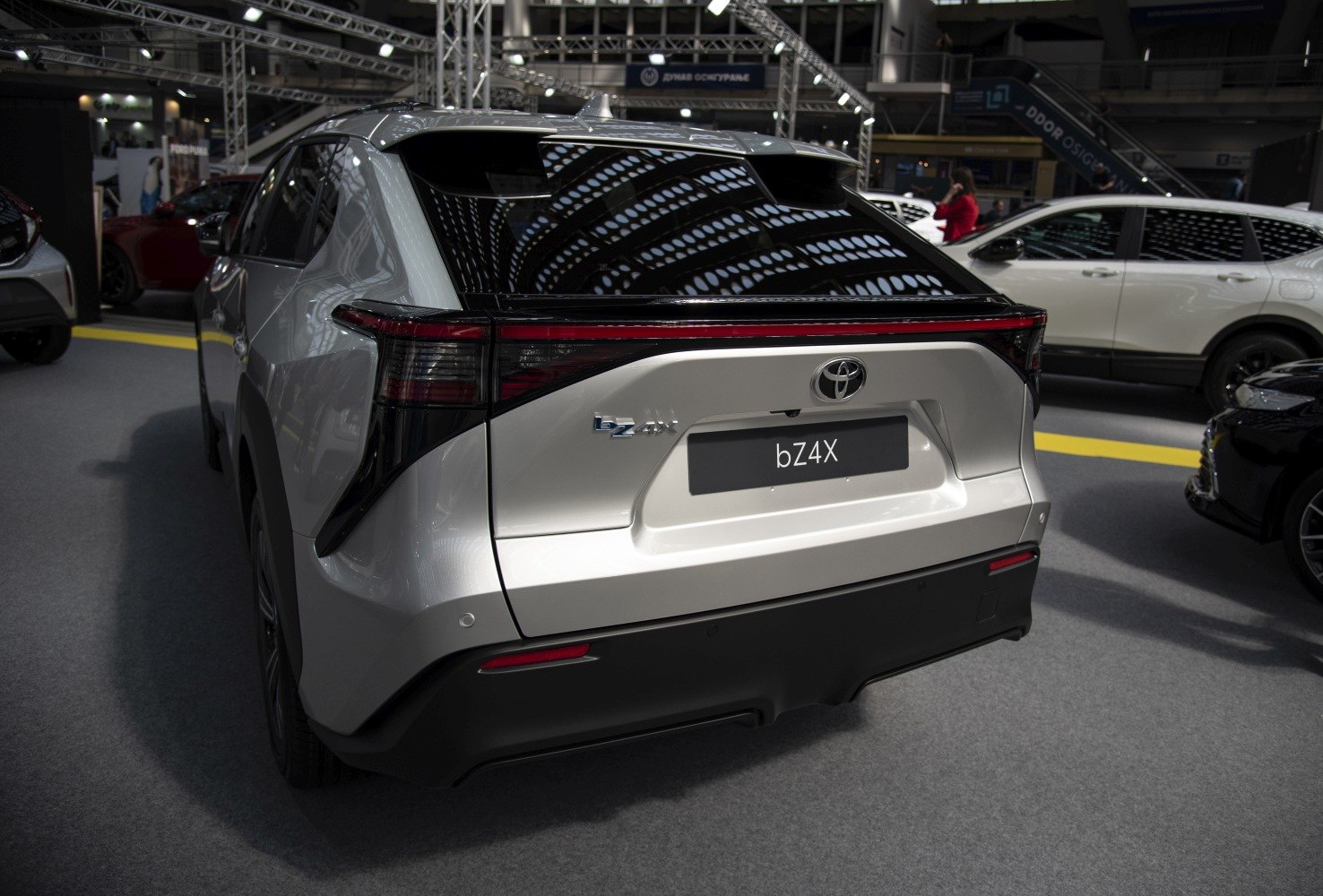 Rear view with distinct tail light and sharp angular rear design