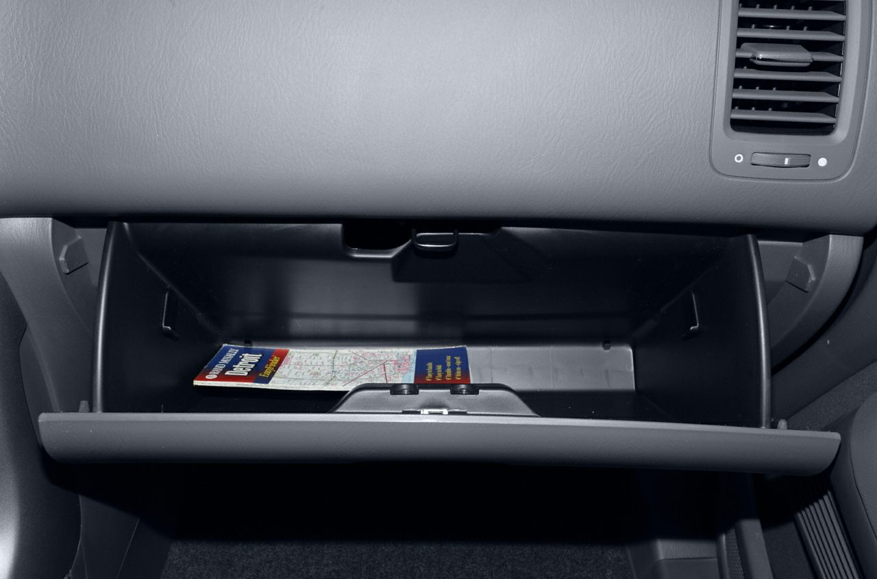 Open glovebox with map inside passenger side dashboard