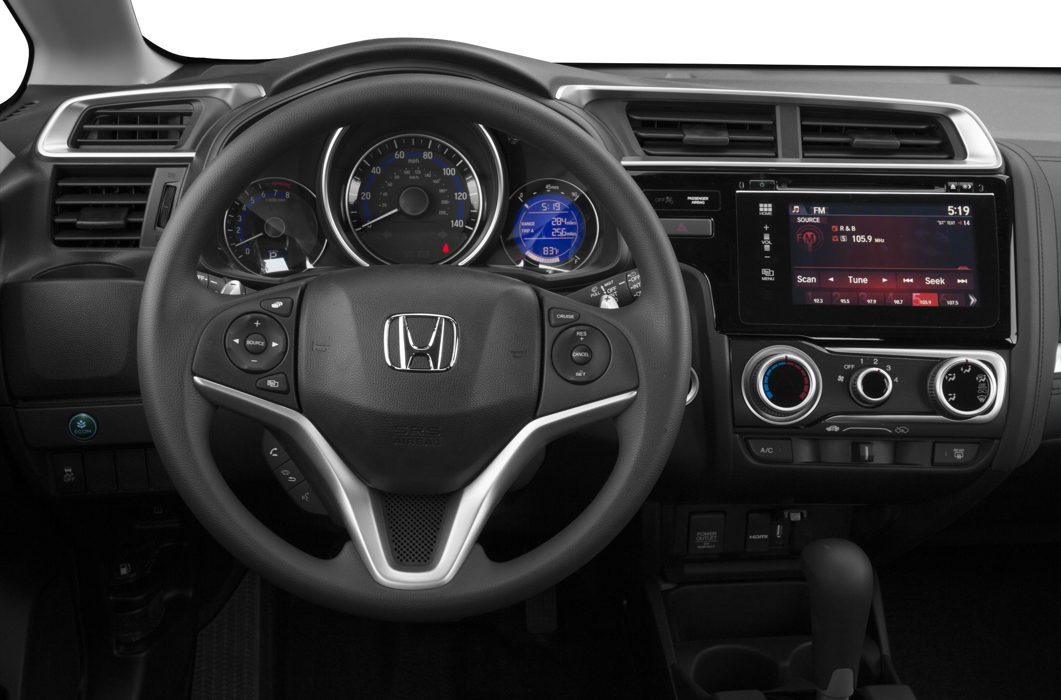 Dashboard and steering wheel with instrument cluster and infotainment controls