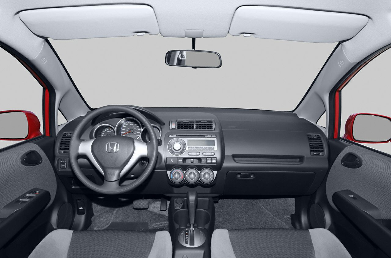 Dashboard, steering wheel, center console controls interior view