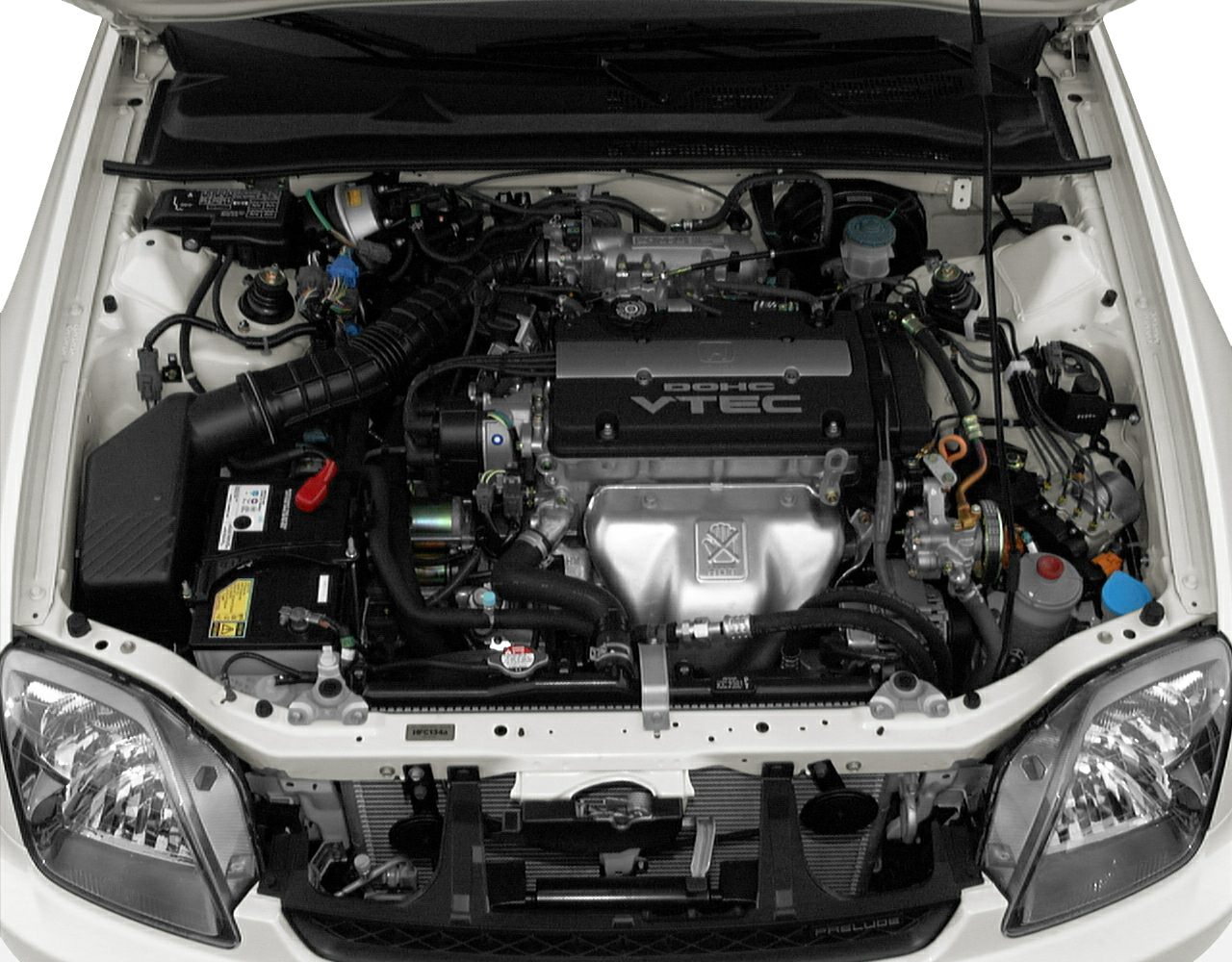 Engine bay with DOHC VTEC system and front headlights
