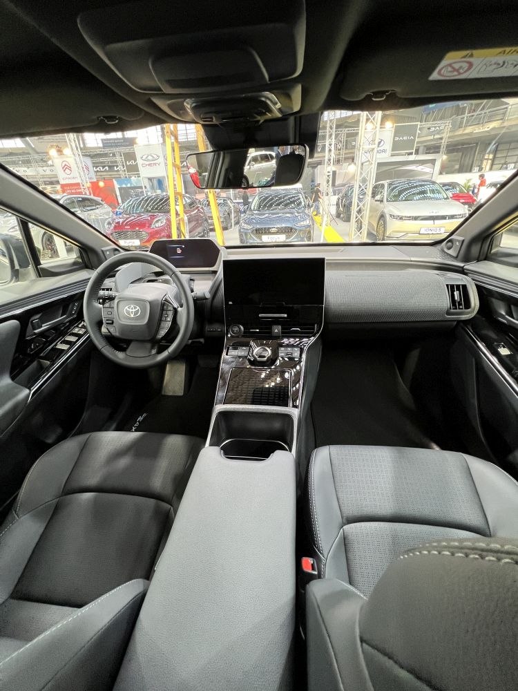 Modern EV interior with digital displays and sleek dashboard design