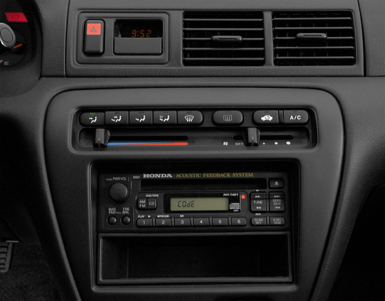 Classic dashboard with climate controls and Honda acoustic feedback stereo