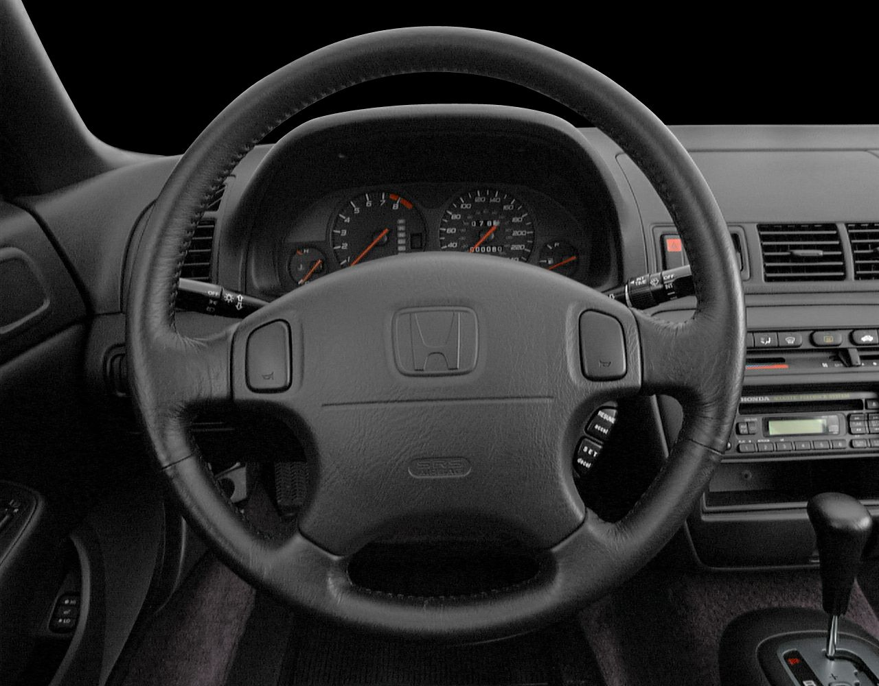 Steering wheel and dashboard with instrument cluster and automatic shifter