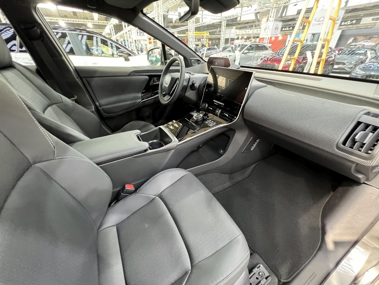 Modern interior with touchscreen center console and premium seats