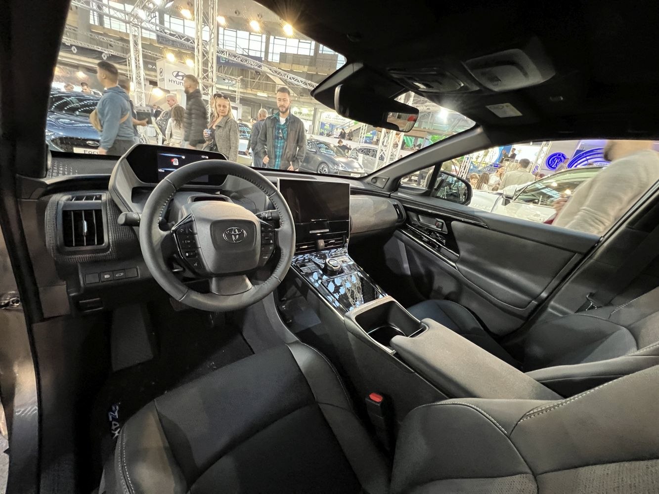 Modern car interior with digital instrument cluster and advanced center console