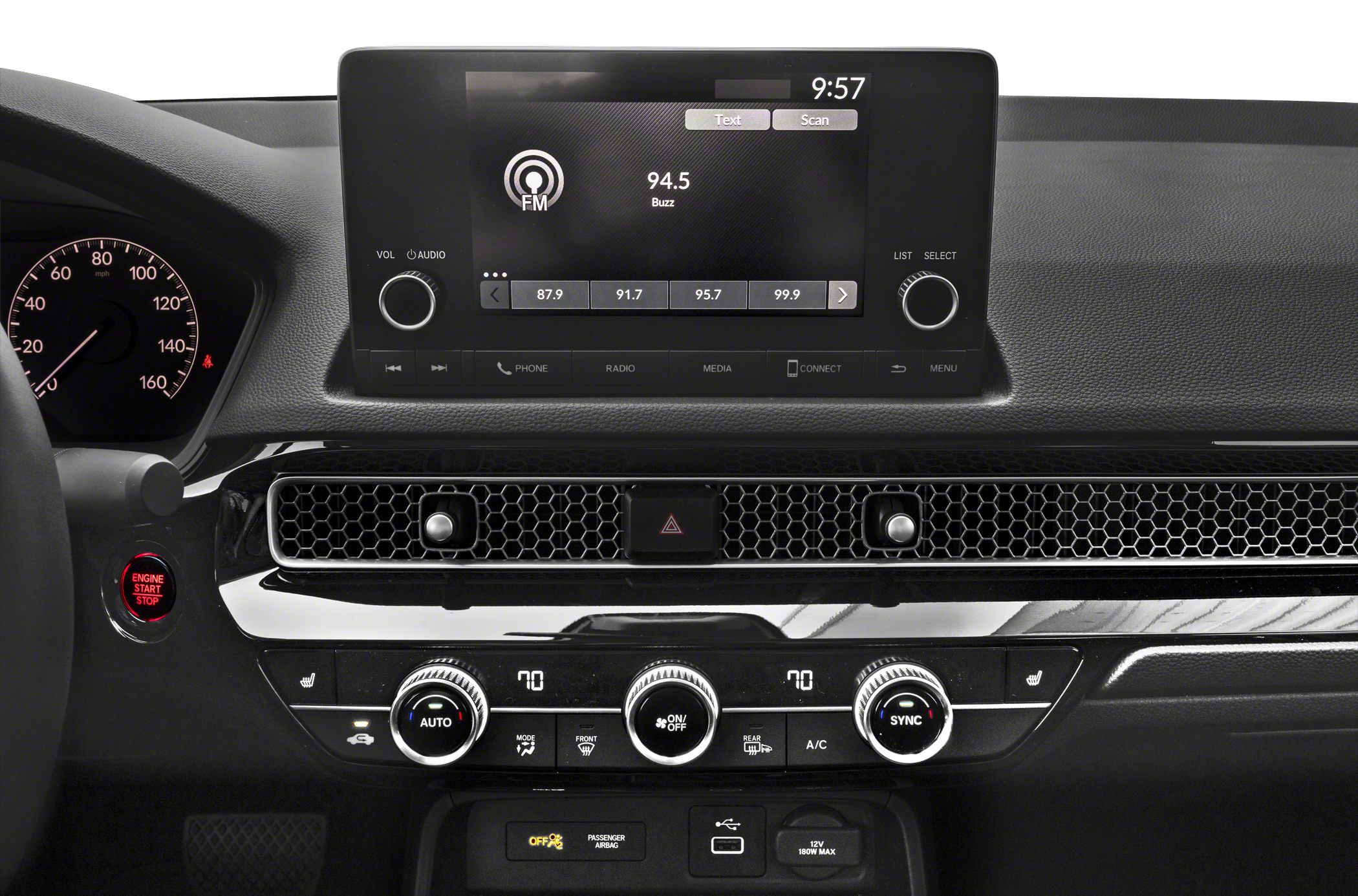 Infotainment screen, climate controls, instrument cluster, engine start button.