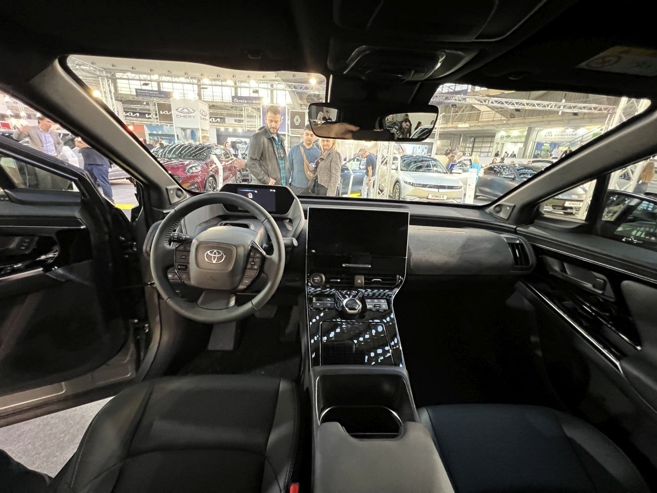 Modern digital dashboard and touchscreen console with steering wheel