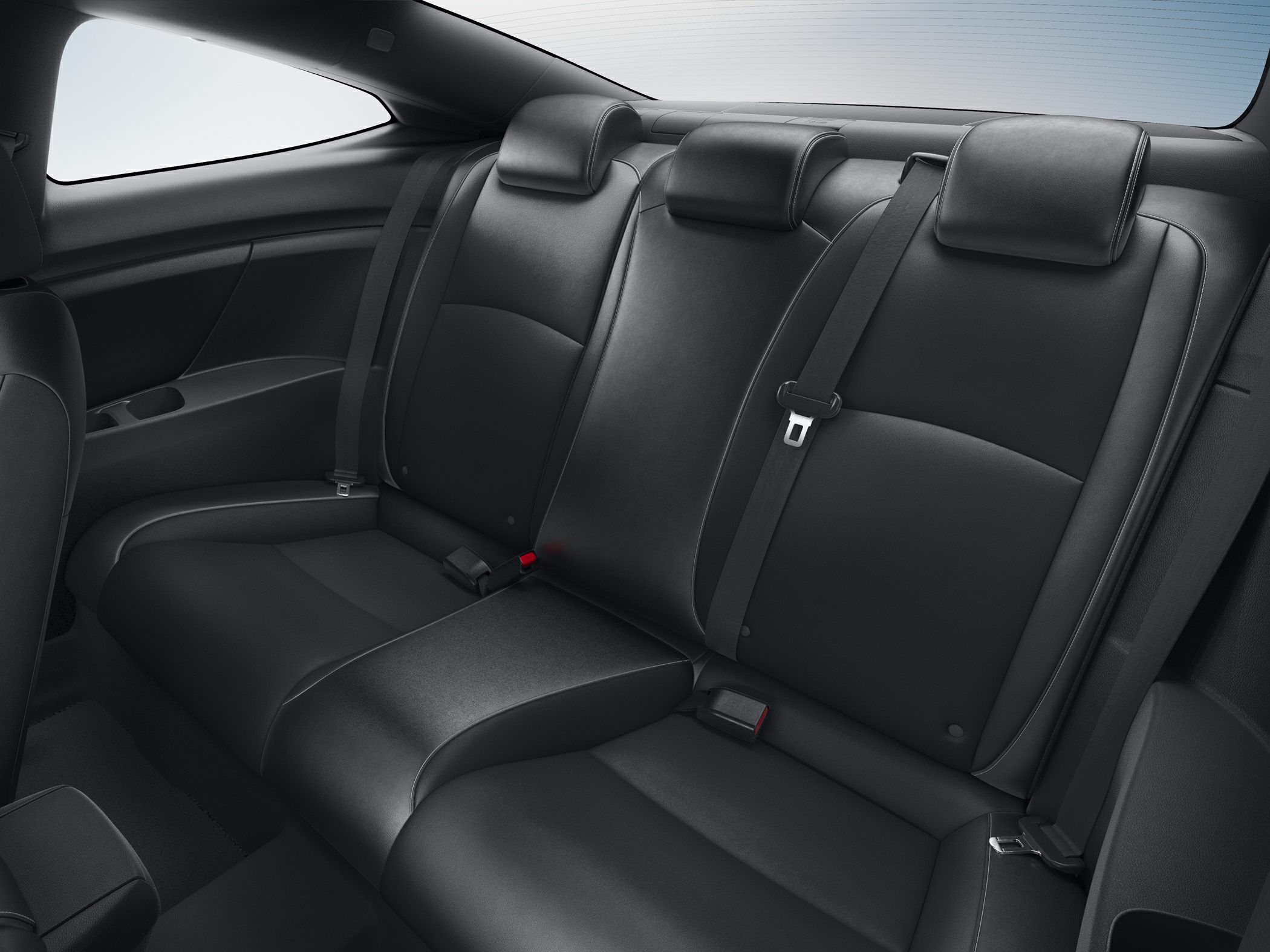 Rear black leather seats with seat belts and headrests