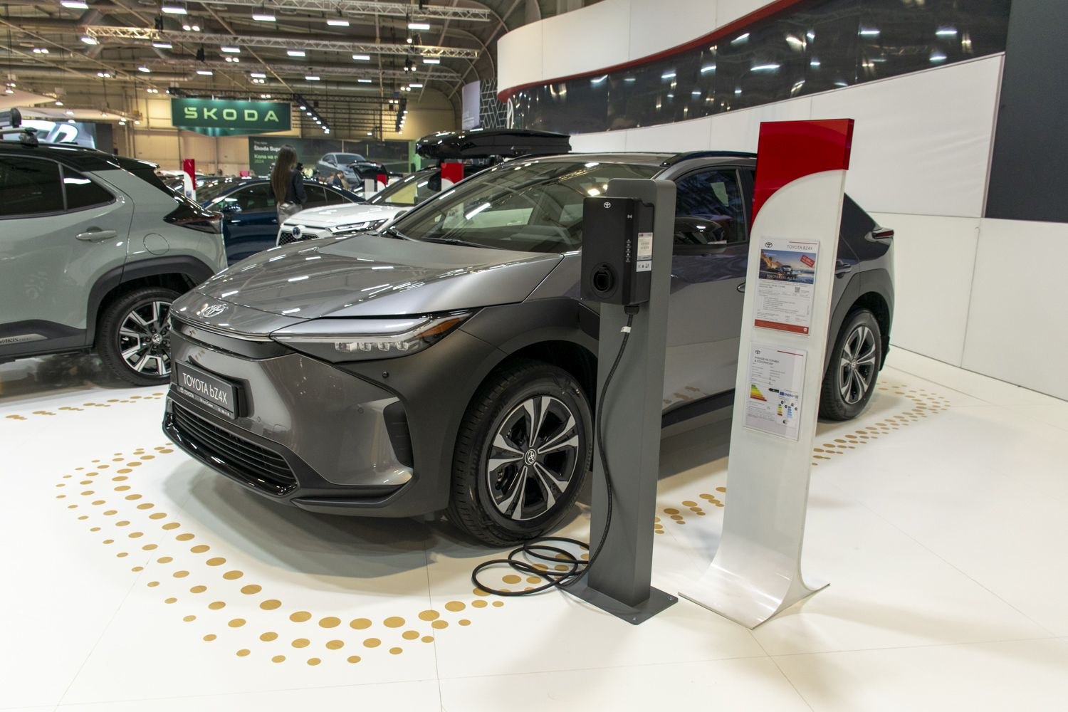 Electric SUV at charging station with modern design