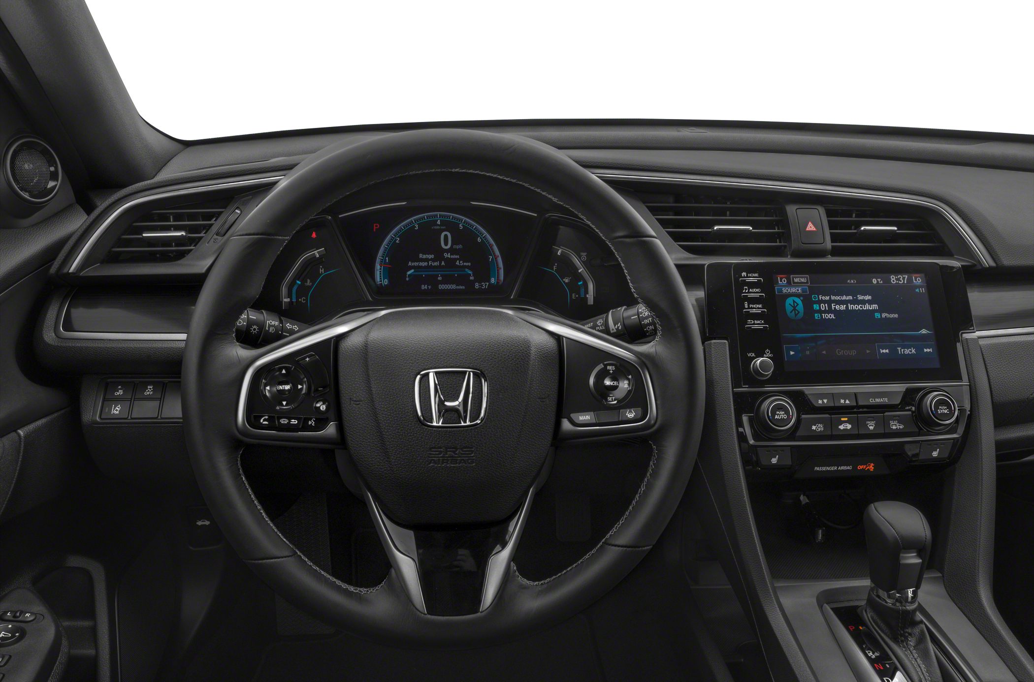Modern dashboard with digital cluster, steering wheel controls, and touchscreen interface