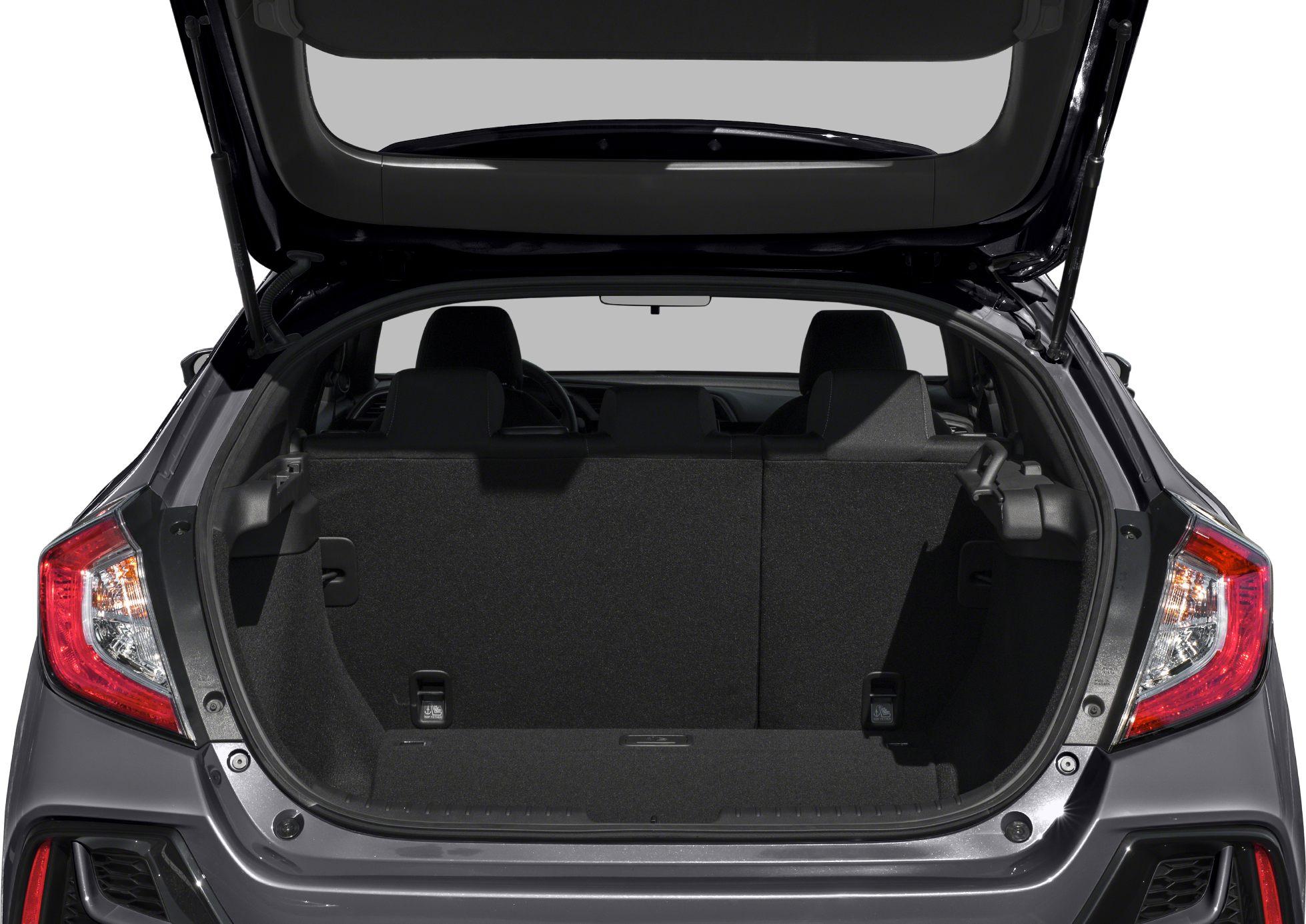 Open rear trunk showing spacious cargo area and rear seats.
