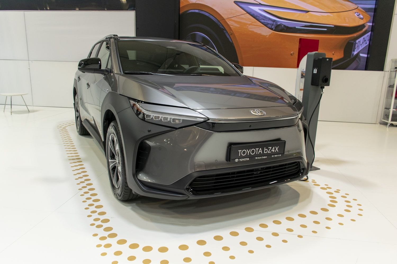 Sleek electric SUV front with sharp LED headlights and aerodynamic styling