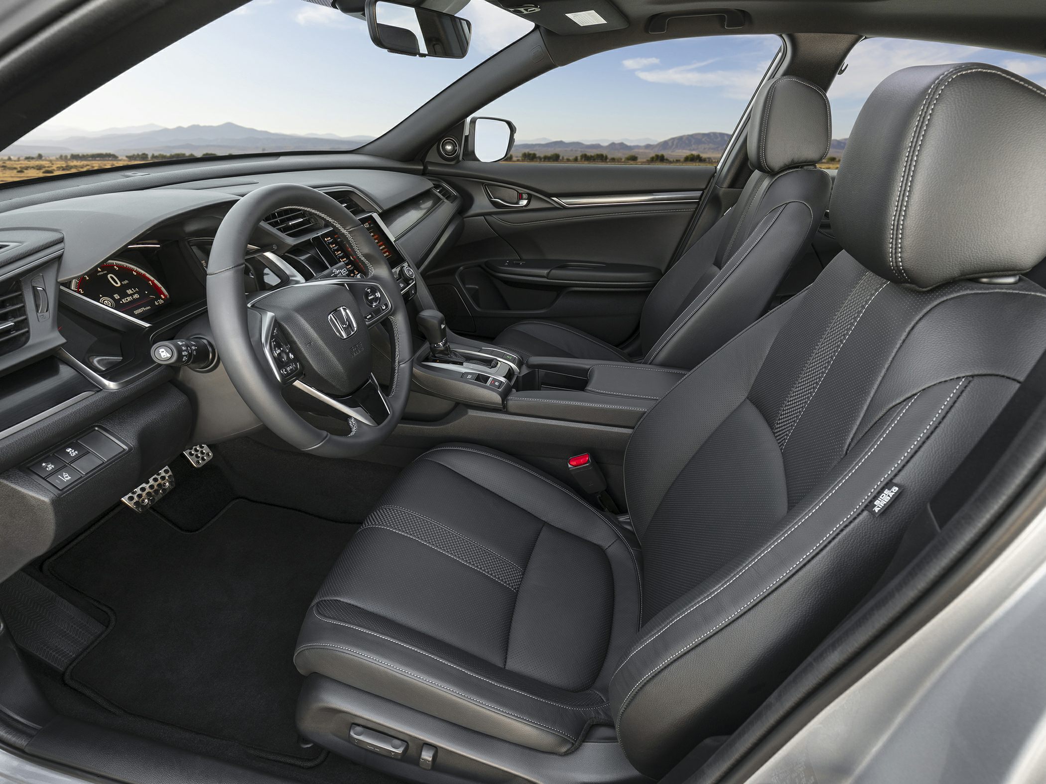 Modern car interior with dashboard and premium seats