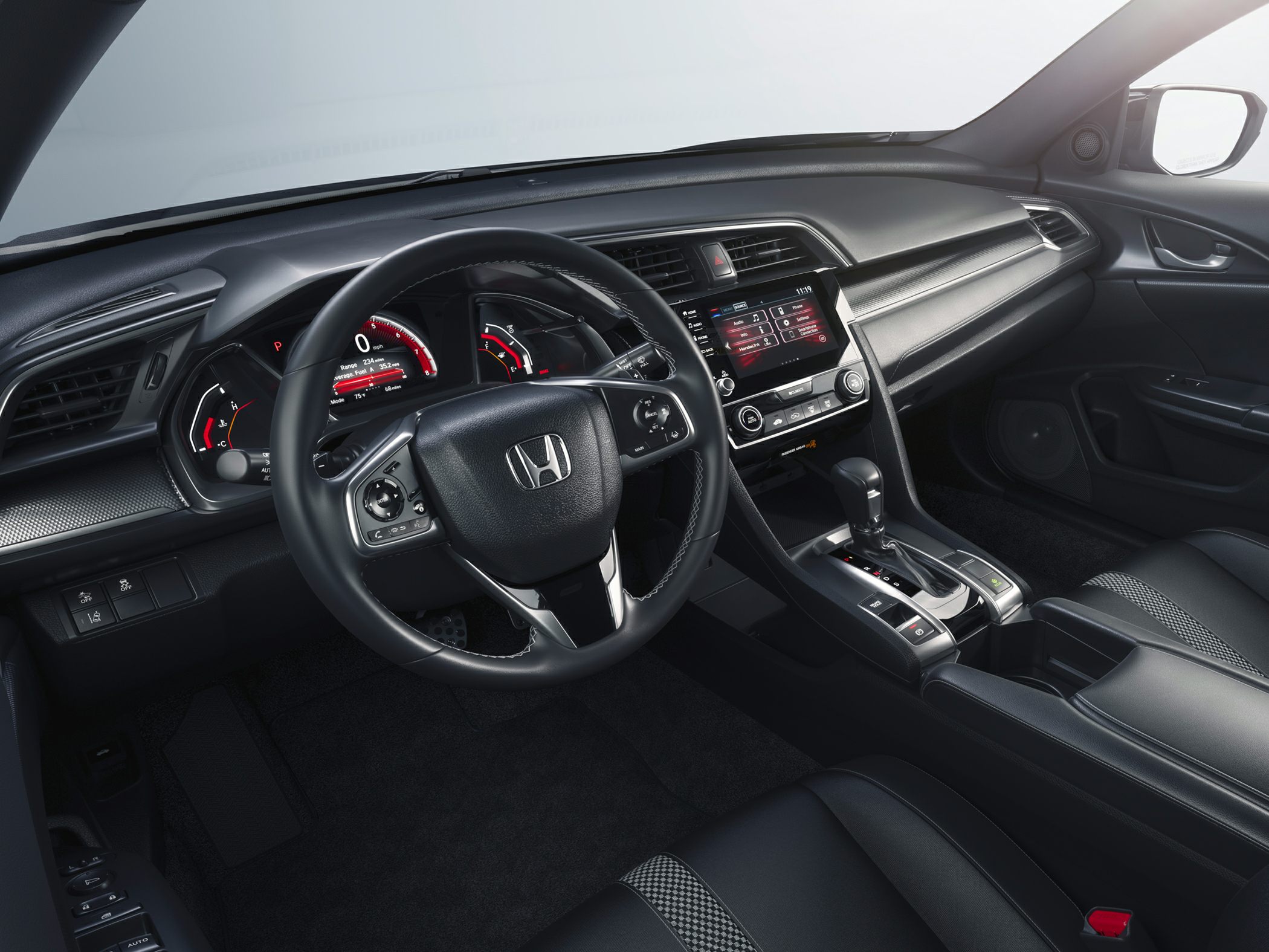 Mid-center console with touchscreen and multifunction steering wheel with digital dashboard