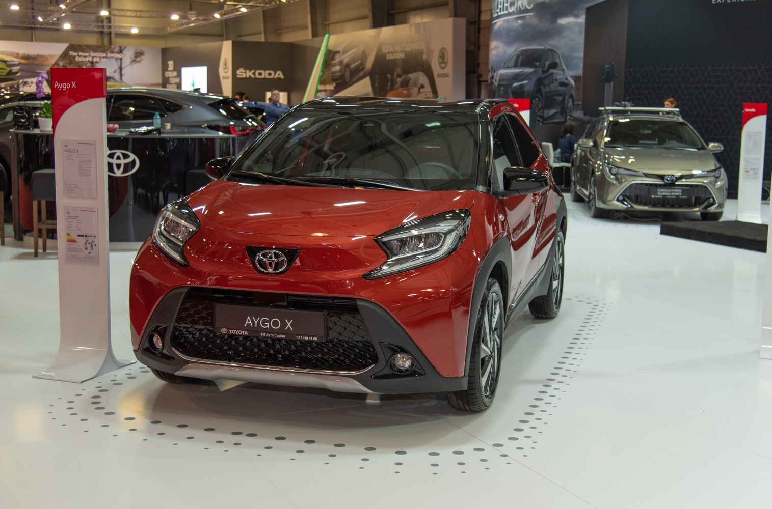 Front view of compact SUV with sharp headlights and sporty grille