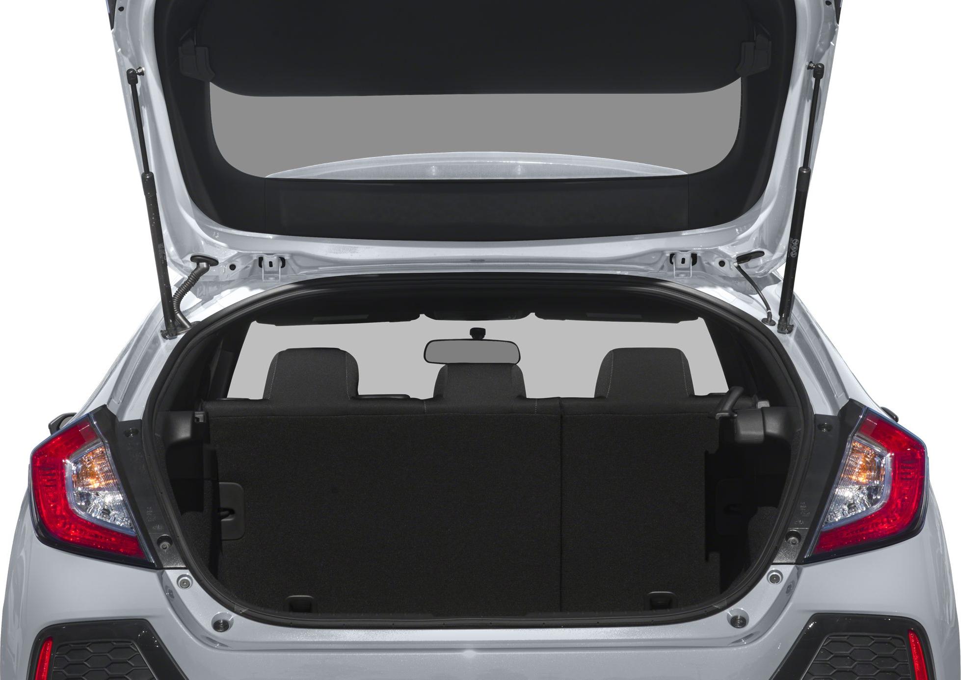 Open hatchback trunk with rear seats and rearview mirror visible