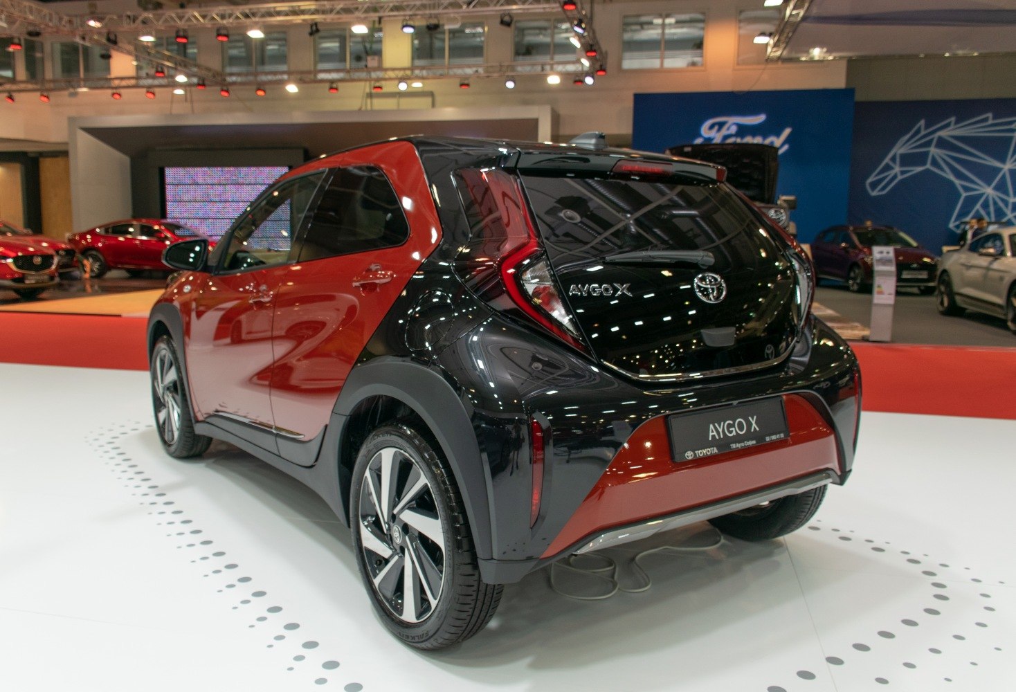 Compact two-tone city crossover with distinctive LED tail lights and alloy wheels.