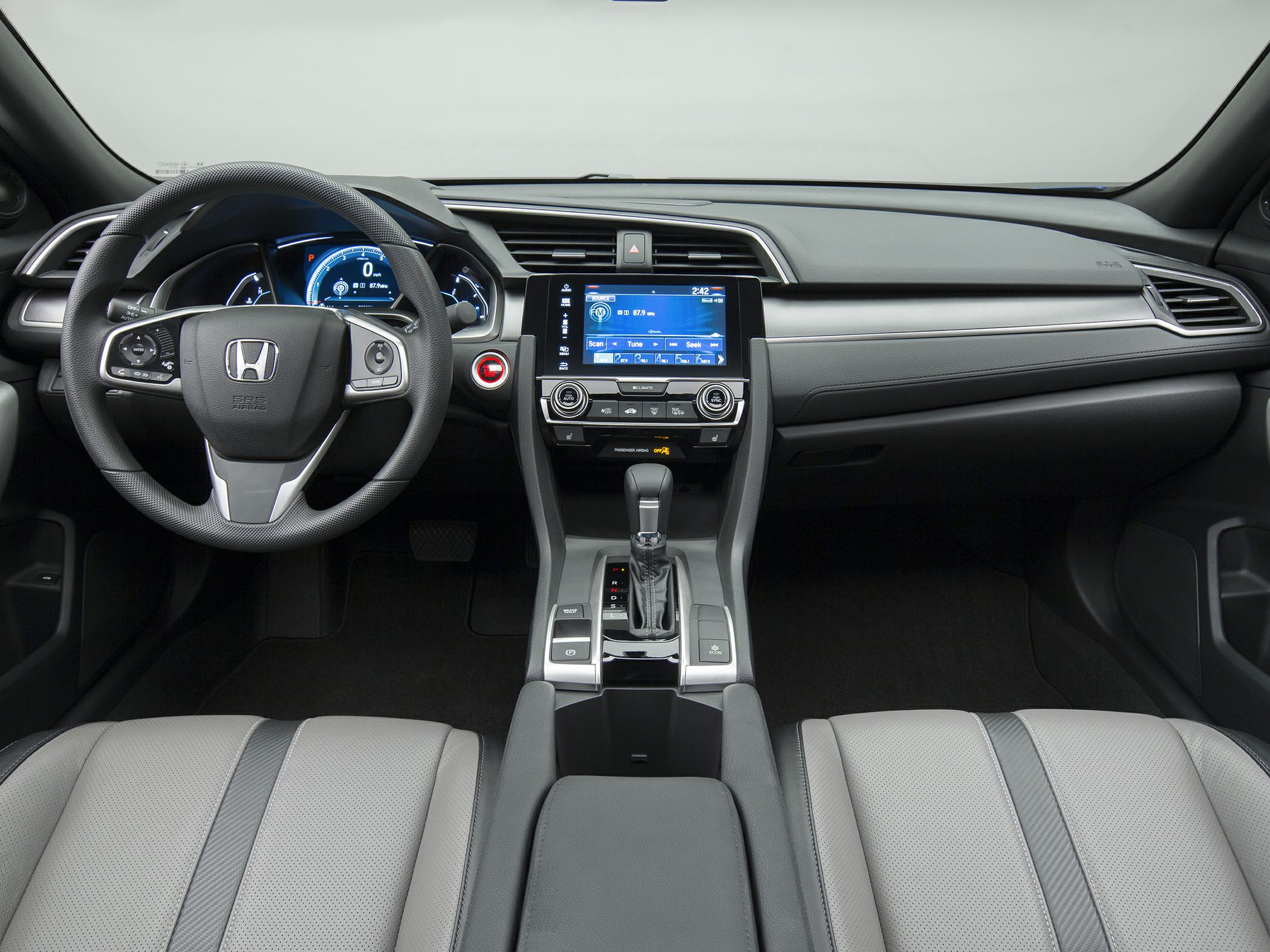 Modern dashboard and steering wheel with infotainment screen