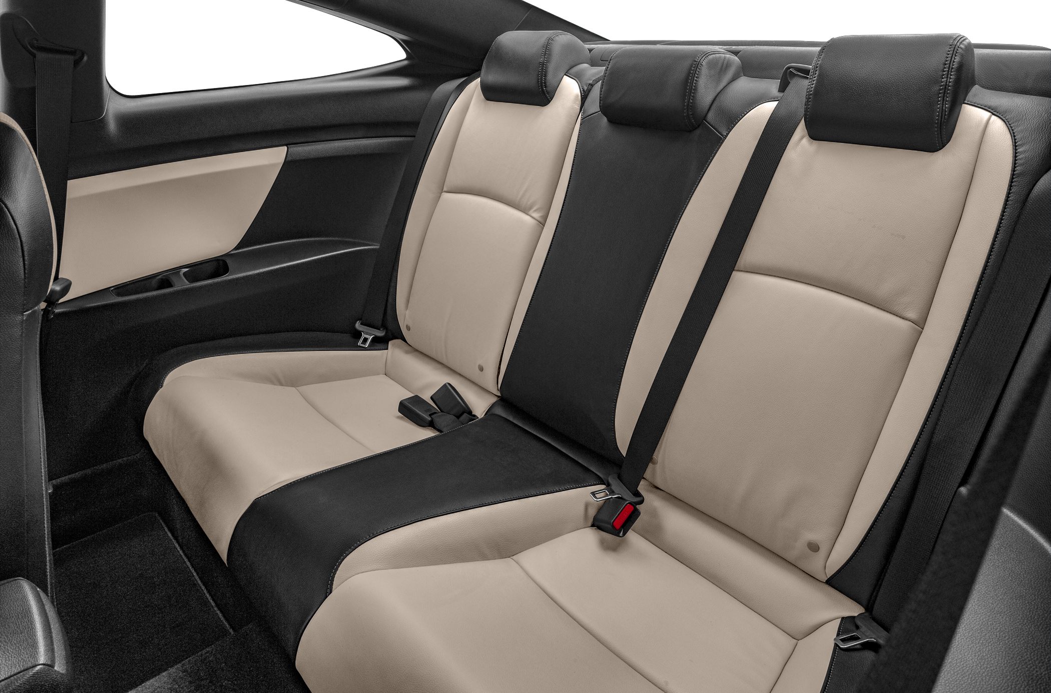 Rear seating area with two-tone beige and black leather upholstery and seat belts.
