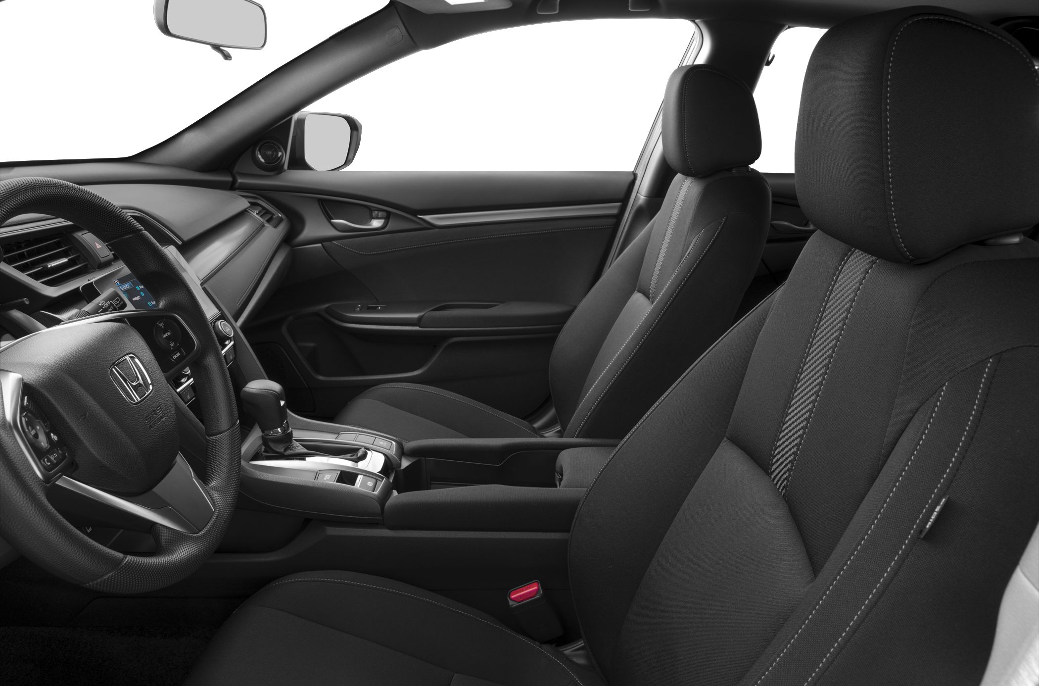 Front seats and dashboard interior with steering wheel and gear shift