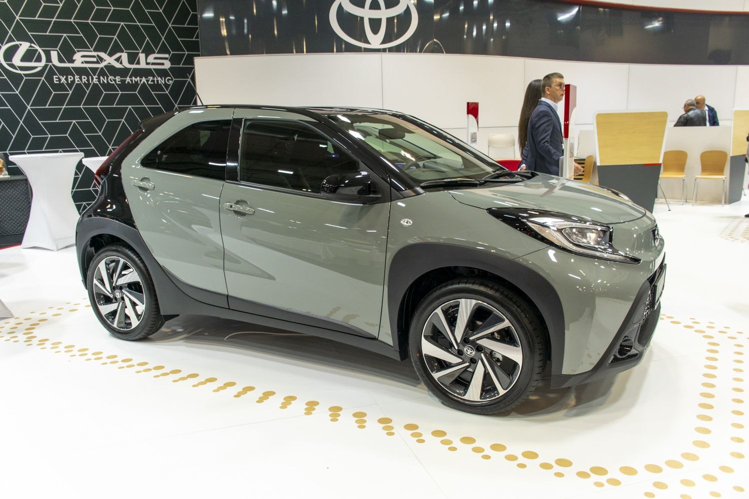 Side view of compact crossover with modern alloy wheels and smooth lines