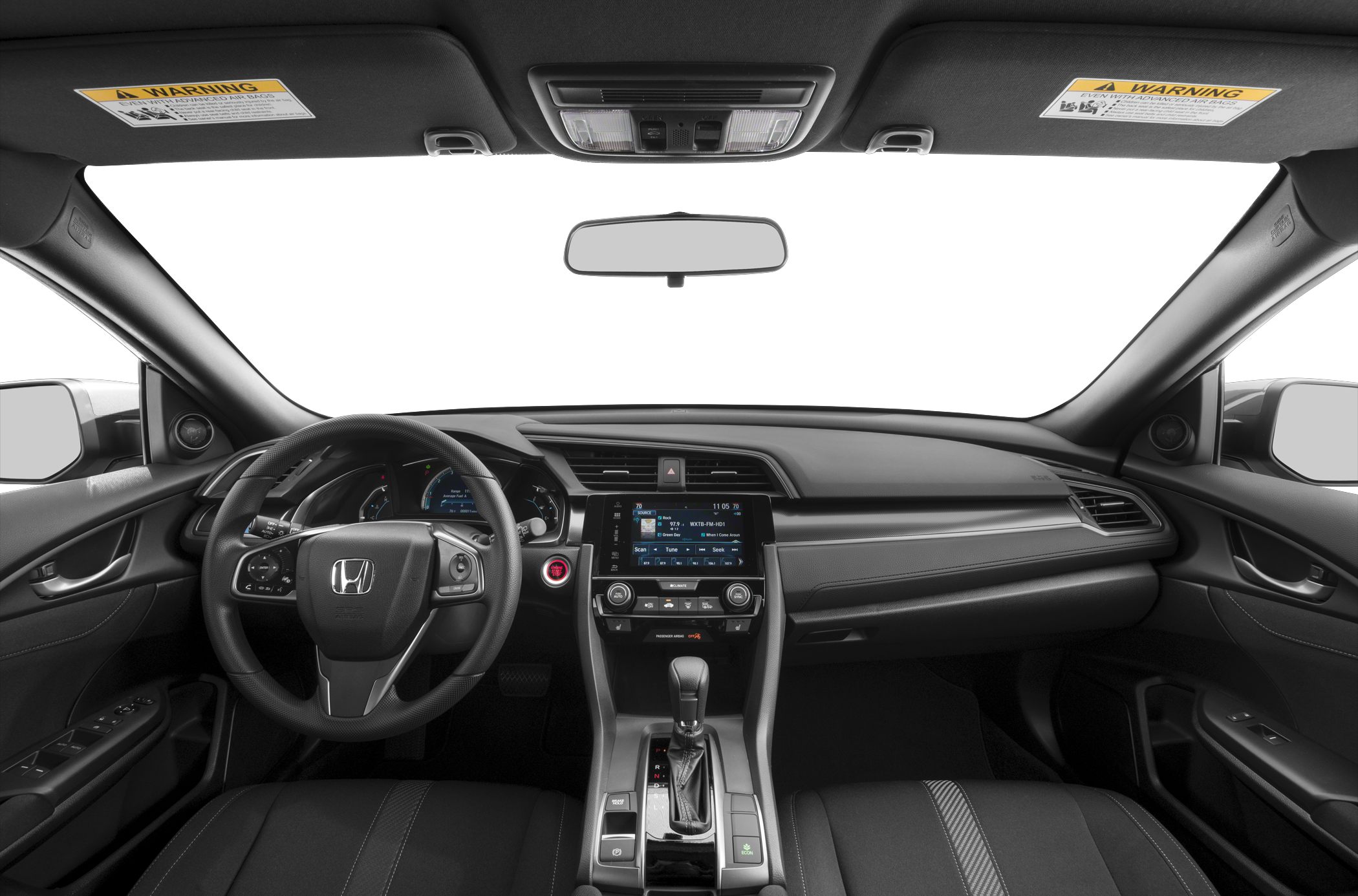 Modern dashboard and steering wheel with infotainment and gear shift.