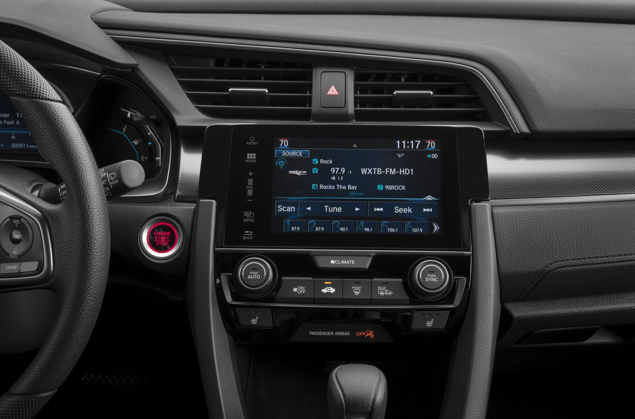 Dashboard with touchscreen infotainment and push start button