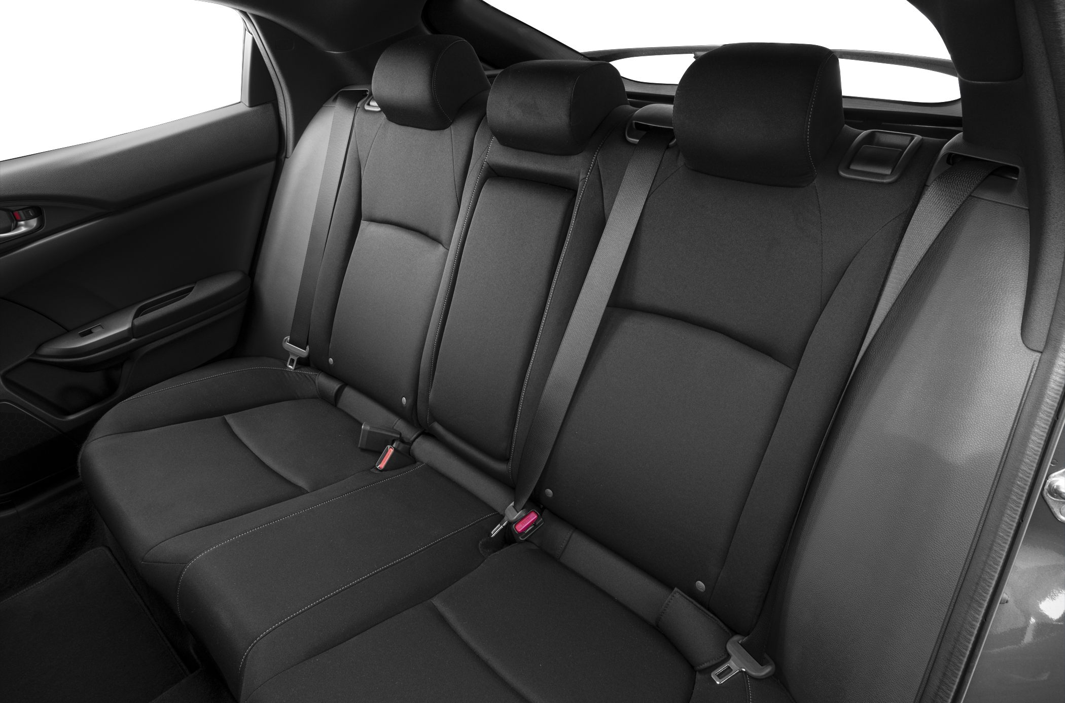 Rear seat interior with three headrests and seat belts