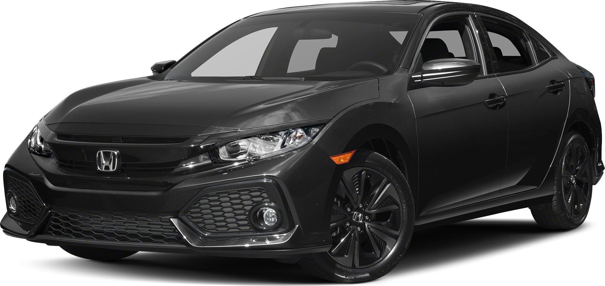 Front angled view with sporty mesh grille and sleek headlights